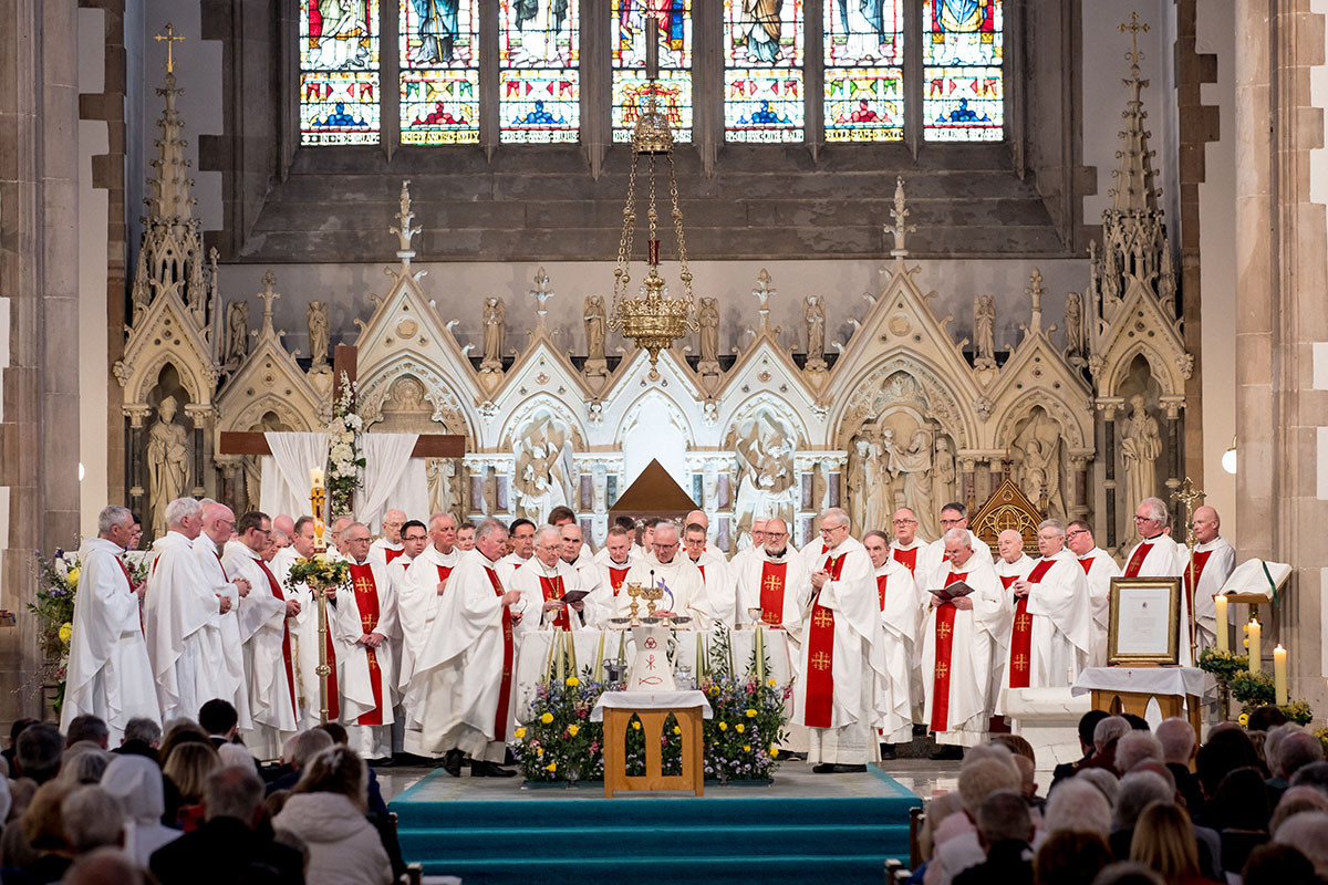 Clergy gathered around the altar during the Silver Jubilee Mass for Bishop Donal McKeown in St Eugene’s Cathedral, Derry